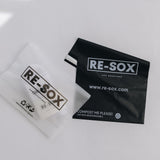 Two RE- SOX packaging on a white background